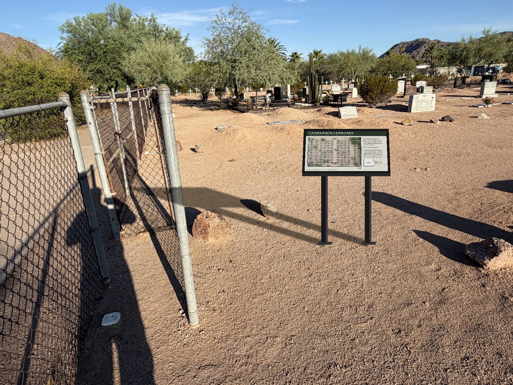 Concept drawing: a dark pedestal sign with the cemetery map on an angled panel, standing on the gravel just inside the walk gate